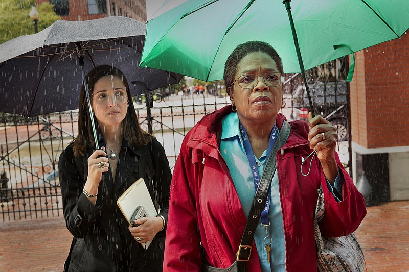 
              This image released by HBO shows Rose Byrne, left, and Oprah Winfrey in a scene from HBO film "The Immortal Life of Henrietta Lacks,"  premiering Saturday at 8 p.m. EDT. (Quantrell Colbert/HBO via AP)
            