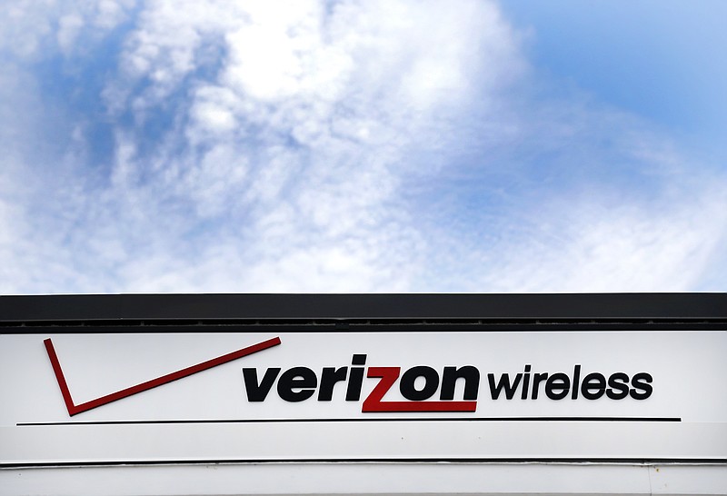 
              FILE - This Monday, July 25, 2016, file photo shows signage at a Verizon store, in North Andover, Mass. On Thursday, April 20, 2017, Verizon announced its profit sunk 20 percent in its first quarter as it lost wireless customers. The New York company says it would have lost even more customers if it didn’t launch its unlimited cellphone plan in February. T-Mobile and Sprint have been trumpeting their cheaper unlimited plans. (AP Photo/Elise Amendola, File)
            
