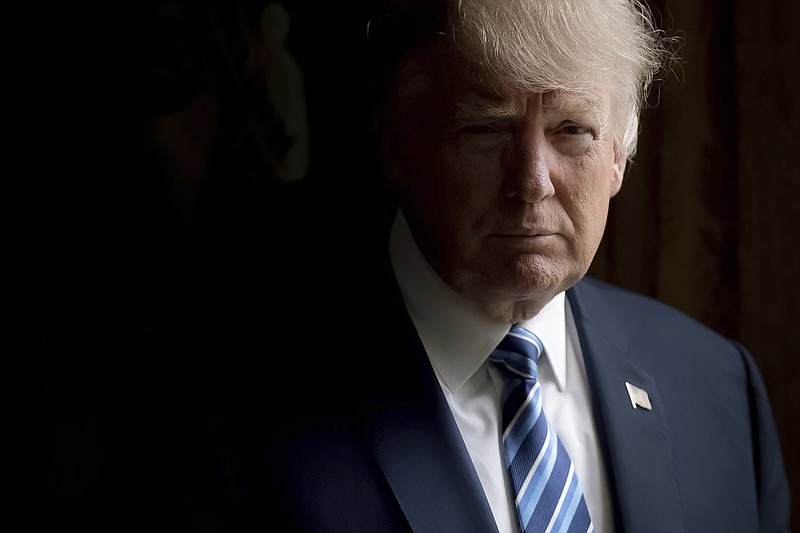 
              President Donald Trump poses for a portrait in the Oval Office in Washington, Friday, April 21, 2017. (AP Photo/Andrew Harnik)
            