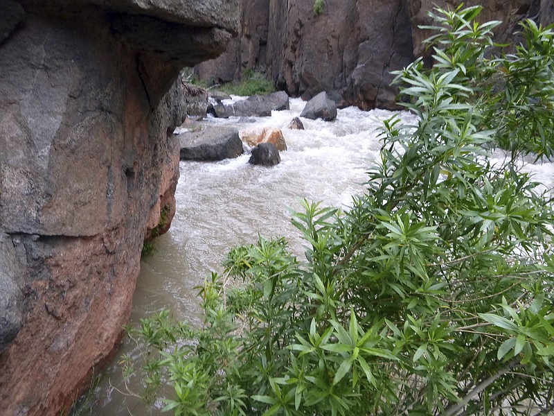 
              This Sunday, April 16, 2017, photo provided by the National Park Service shows Tapeats Creek in Grand Canyon National Park in Arizona. Authorities are searching for Jackson Standefer, 14, and Lou-Ann Merrell, 62, after the pair lost their footing Saturday and fell into the water during a family trip in a remote area of the Arizona park. (National Park Service via AP)
            