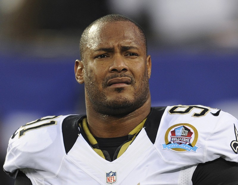 
              FILE - In this Dec. 9, 2012, file photo, New Orleans Saints defensive end Will Smith appears before an NFL football game against the New York Giants in East Rutherford, N.J. Cardell Hayes, the man who killed Smith in an argument following a traffic crash avoided a mandatory life sentence when a jury convicted him of manslaughter instead of second-degree murder. But Hayes may still be locked away for a very long time if prosecutors get their way at a sentencing hearing Wednesday, April 19, 2017. (AP Photo/Bill Kostroun, File)
            