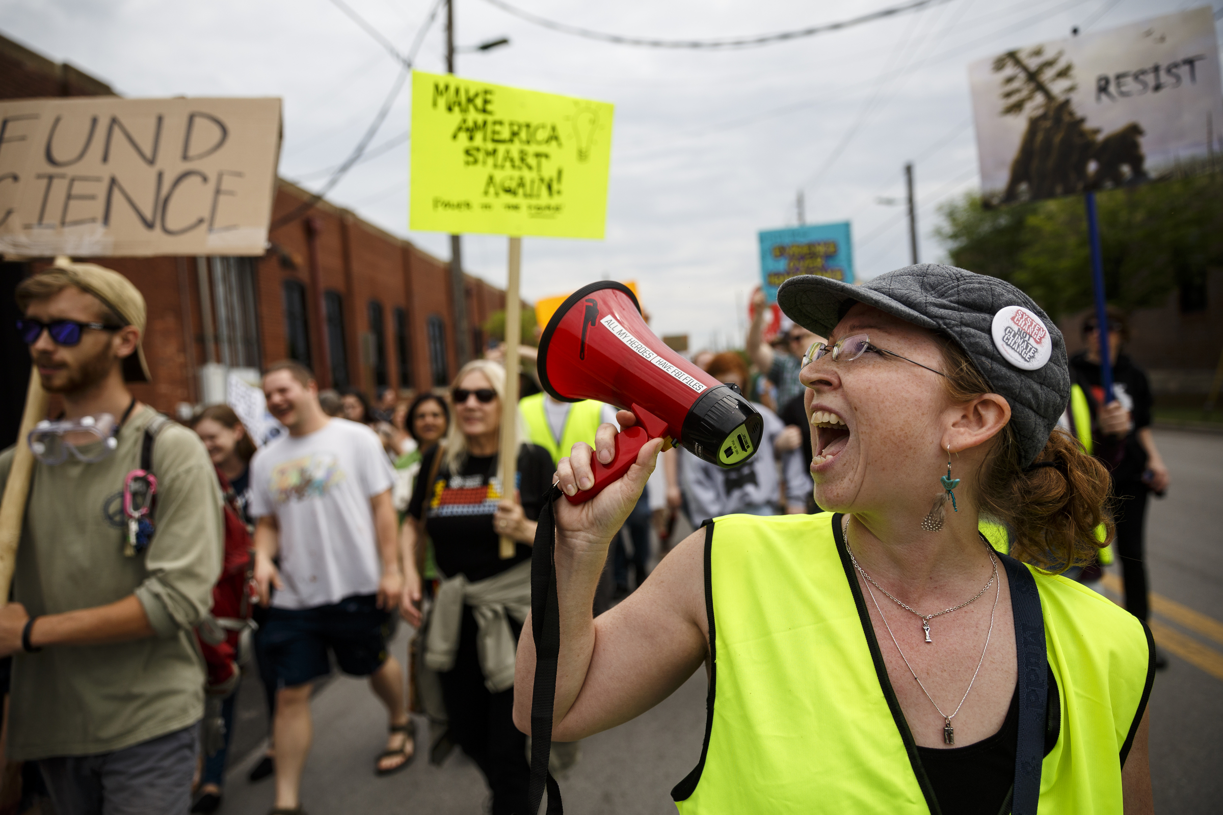 Patricia Bazemore shouts into a megaphone during the March for Science on Saturday, April 22, 2017, in Chattanooga, Tenn. About a thousand demonstrators marched from the Main Terrain Art Park to Riverfront Parkway and back in support of science and education in solidarity with other marches nationwide.