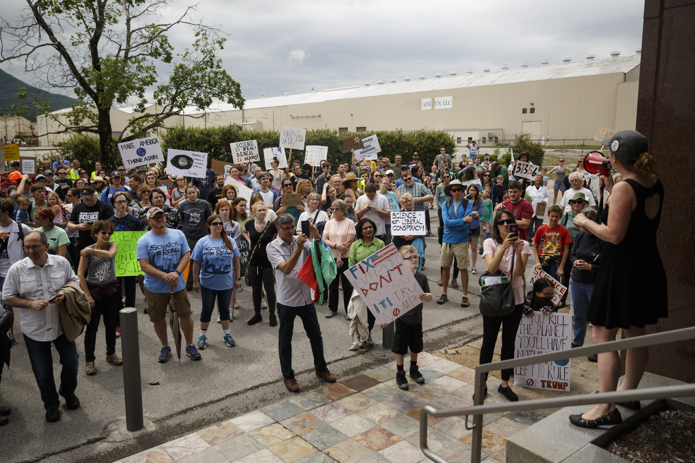Demonstrators gather outside of the TDEC offices during the March for Science on Saturday, April 22, 2017, in Chattanooga, Tenn. About a thousand demonstrators marched from the Main Terrain Art Park to Riverfront Parkway and back in support of science and education in solidarity with other marches nationwide.