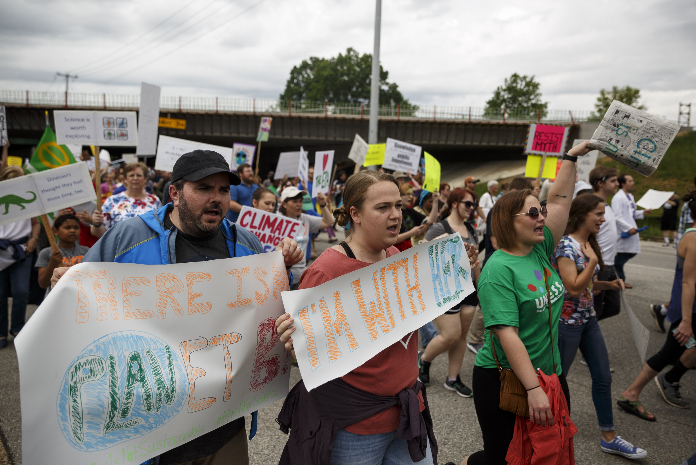 Demonstrators march on Main Street during the March for Science on Saturday, April 22, 2017, in Chattanooga, Tenn. About a thousand demonstrators marched from the Main Terrain Art Park to Riverfront Parkway and back in support of science and education in solidarity with other marches nationwide.