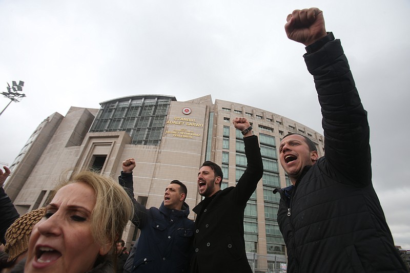 
              FILE- In this Tuesday, April 18, 2017 photo, supporters of the main opposition Republican People's Party, or CHP, chant slogans during a protest outside Istanbul's Court House. In a series of tweets, Bozdag slammed the main opposition party on Saturday, April 22, 2017, for contesting the outcome of Sunday's referendum on expanding presidential powers and said there is no judicial path to reverse the ruling. (AP Photo/Petros Karadjias, File)
            