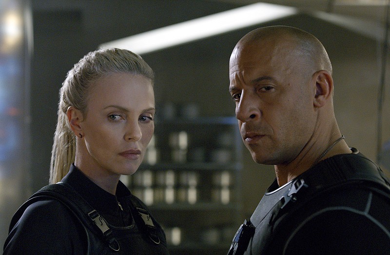 
              This image released by Universal Pictures shows Charlize Theron, left, and Vin Diesel in "The Fate of the Furious." (Universal Pictures via AP)
            