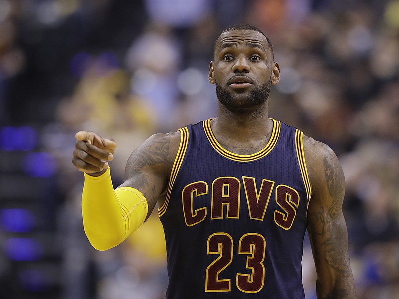 
              Cleveland Cavaliers' LeBron James instructs teammates during the first half in Game 4 of a first-round NBA basketball playoff series against the Indiana Pacers, Sunday, April 23, 2017, in Indianapolis. (AP Photo/Darron Cummings)
            