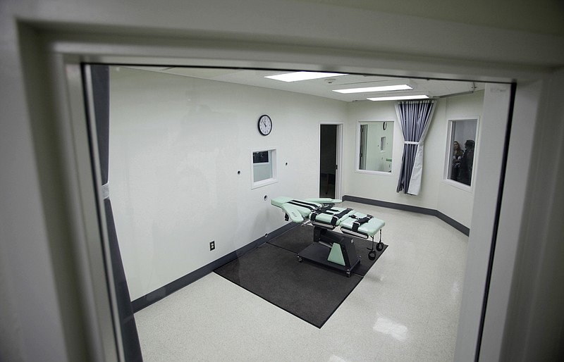 
              FILE - This Sept. 21, 2010, file photo shows the interior of the lethal injection facility at San Quentin State Prison in San Quentin, Calif. California corrections officials expect to meet a Wednesday, April 26, 2017 deadline to submit revised lethal injection rules to state regulators, trying again with technical changes after the first attempt was rejected in December. While California has long been what one expert calls "a symbolic death penalty state," the nation's most populous state may now be easing back toward allowing executions. (AP Photo/Eric Risberg, File)
            