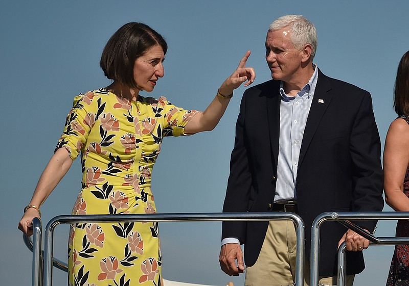 
              U.S. Vice President Mike Pence, right, chats with New South Wales Premier Gladys Berejiklian during a cruise on the harbor in Sydney, Sunday, April 23, 2017. Pence is on the last part of his four-country trip to Asia and Australia. (Peter Parks/Pool via AP)
            