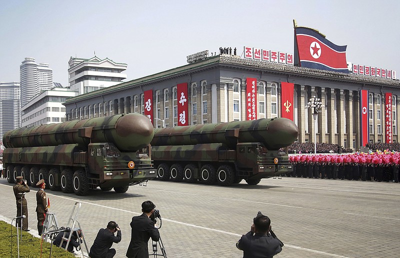 
              In this April 15, 2017, photo, missiles are paraded across Kim Il Sung Square during a military parade to celebrate the 105th birth anniversary of Kim Il Sung in Pyongyang, North Korea. Fresh off an immense North Korean parade that revealed an arsenal of intercontinental ballistic missiles, rival South Korea and its allies are bracing for the possibility that Pyongyang's follow-up act will be even bigger. (AP Photo/Wong Maye-E)
            