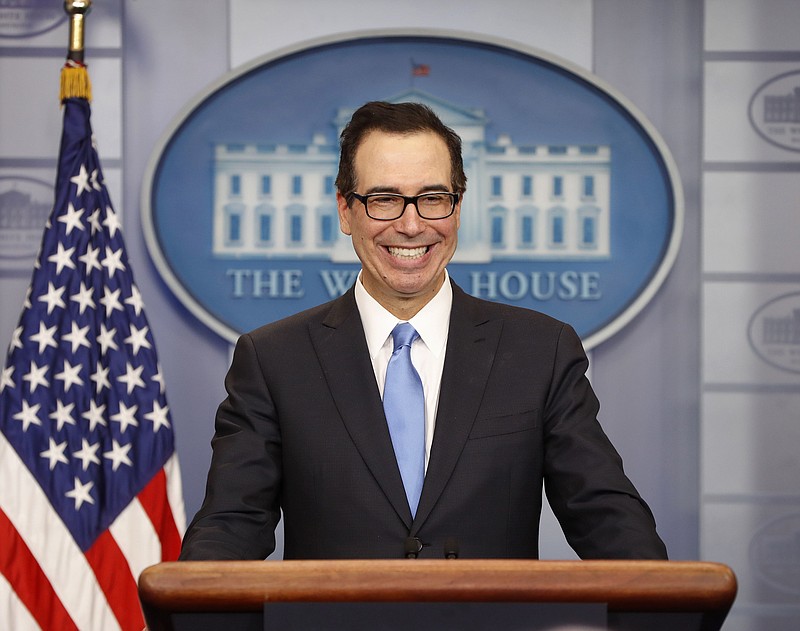 
              Treasury Secretary Steve Mnuchin smiles while speaking to the media during the daily briefing in the Brady Press Briefing Room of the White House in Washington, Monday, April 24, 2017. (AP Photo/Pablo Martinez Monsivais)
            