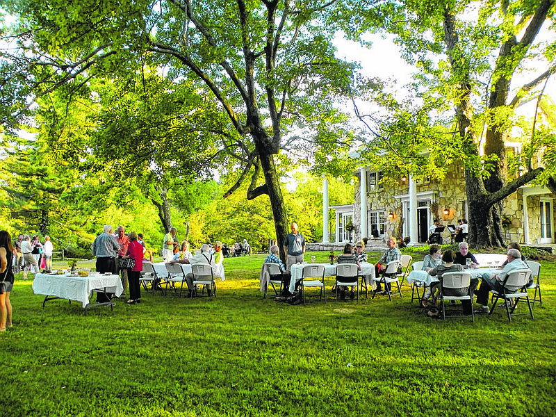 A wine and cheese fundraiser for McCoy Farm and Gardens is held on the grounds last fall. A similar benefit will be held Friday, April 28 from 5:30-7:30 p.m.