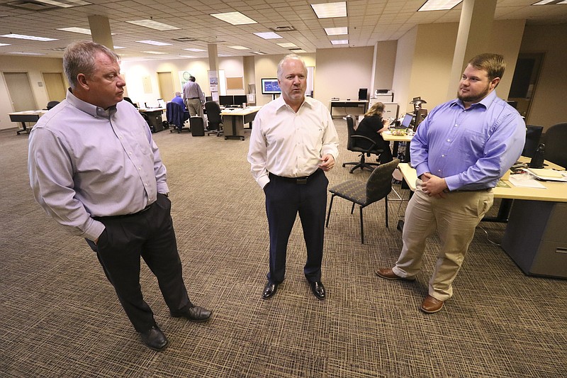 Staff Photo by Dan Henry / The Chattanooga Times Free Press- 4/11/17. Bruce Trantham, co-owner of Tranco Global, Brad Kemp, COO of Tranco Global and Abe Church, Director of Operations for Tranco Global, from left, speak about their company's growth while at Tranco Global's office in Chattanooga, Tenn., on Tuesday, April 11, 2017.
