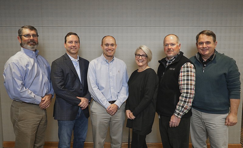 J+J Industries' management team includes, from left, Doug Schneller, vice president of logistics and facilities; David Jolly, president; Josh Hall, vice president of manufacturing; Ginger Gilbert , director of product design; Ross Leonard, vice president of marketing, and Bill Blackstock, vice president of sales.