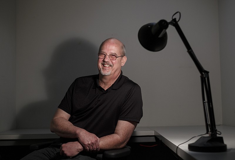 John Rouser, whose local franchise helps people find assisted living communities for their elderly parents, is photographed in the studio Wednesday, April 12, 2017, in Chattanooga, Tenn.