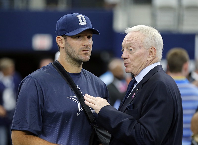 
              This Oct. 11, 2015 photo shows Dallas Cowboys owner Jerry Jones, right, talking with quarterback Tony Romo before an NFL football game against the New England Patriots in Arlington, Texas. Oct. 11, 2015. Jones honored DeMarcus Ware with the announcement that the franchise sacks leader would retire as a Cowboy, then engaged in a draft discussion centered largely on finding the team’s next dominant pass rusher. It’s exactly the opposite with Tony Romo, since the Cowboys have yet to pay homage to their 10-year starting quarterback as he heads to the broadcast booth while Dallas prepares for the start of the NFL draft feeling secure in the future under center. (AP Photo/Brandon Wade)
            