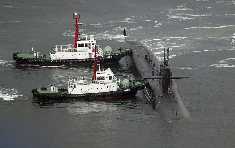 
              The nuclear-powered submarine USS Michigan approaches to join the U.S. aircraft carrier USS Carl Vinson in drills near the Korean Peninsula, at Busan port in Busan, South Korea, Tuesday, April 25, 2017. North Korea marks the founding anniversary of its military on Tuesday, and South Korea and its allies are bracing for the possibility that it could conduct another nuclear test or launch an intercontinental ballistic missile for the first time. (Jo Jung-ho/Yonhap via AP)
            