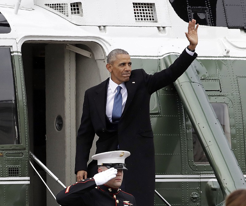 
              FILE - In this Jan. 20, 2017, file photo, former President Barack Obama waves as he boards a Marine helicopter during a departure ceremony on the East Front of the U.S. Capitol in Washington after President Donald Trump was inaugurated. Obama is scheduled to hold the first public event of his post-presidential life Monday, April 24, 2017, in the place where he started his political career. He will speak at the University of Chicago, where his presidential library is planned. (AP Photo/Evan Vucci, File)
            
