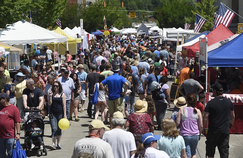 Cedar Avenue is lined with vendor's tents during festival weekend.