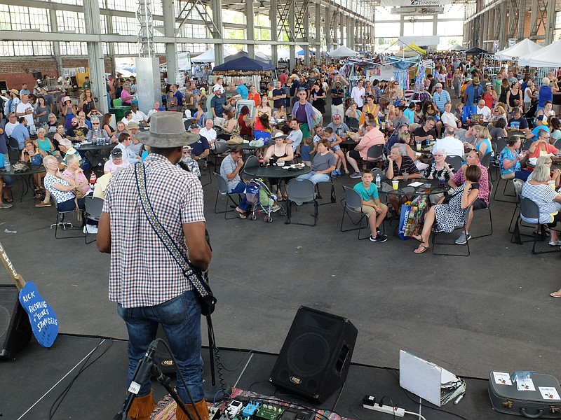 In addition to shopping locally produced foods and crafts, visitors to Chattanooga Markets can enjoy live entertainment, like this past performance from Rick Rushing.