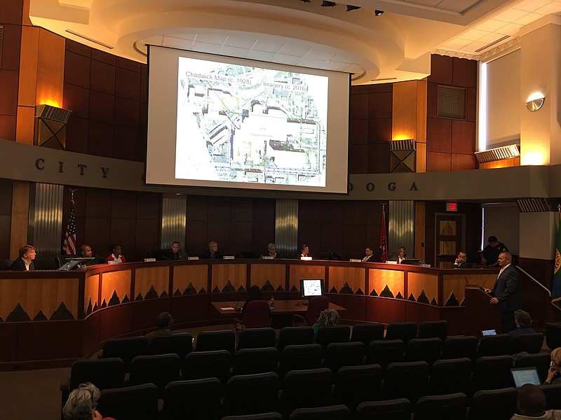 Chattanooga Public Works Administrator Justin Holland, right, reviews the Central Avenue storm drain project with the city council.