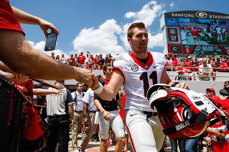 Georgia quarterback Jake Fromm greets fans before last Saturday's G-Day spring game inside Sanford Stadium.