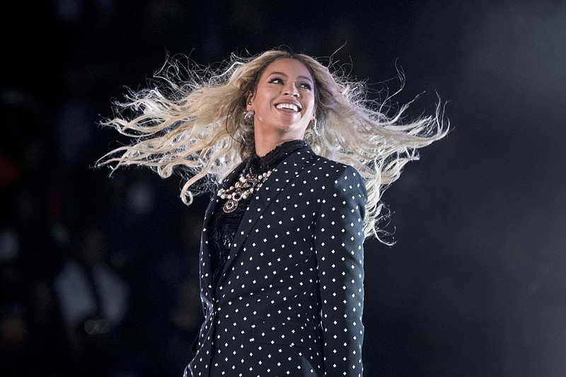 
              FILE - In this Nov. 4, 2016, file photo, Beyonce performs at a Get Out the Vote concert for Democratic presidential candidate Hillary Clinton at the Wolstein Center in Cleveland. Beyonce marked the one-year anniversary of her album "Lemonade" on April 25, 2017, by announcing scholarships for black women to attended selected colleges. (AP Photo/Andrew Harnik, File)
            