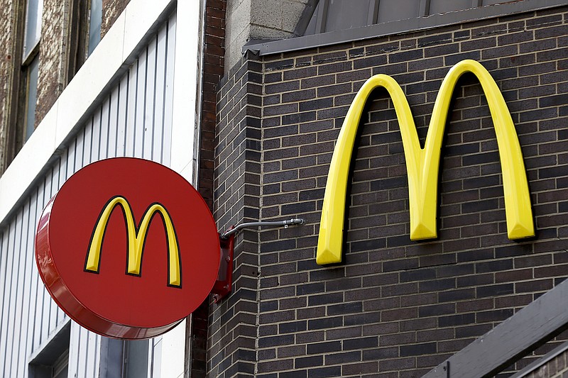 
              In this Monday, April 24, 2017, photo, corporate signage hangs at a McDonald's restaurant in downtown Pittsburgh. McDonald's Corp. reports earnings on Tuesday, April 25. (AP Photo/Keith Srakocic)
            