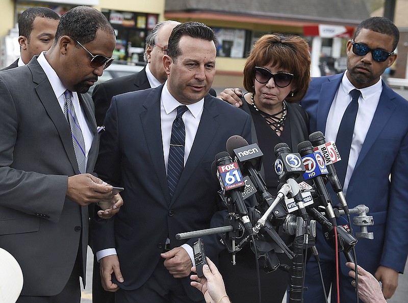 
              Aaron Hernandez's defense attorneys, from left, Ronald Sullivan, Jose Baez, Linda Kenney Baden and Robert Proctor speak after a private service for Hernandez at O'Brien Funeral Home, Monday, April 24, 2017, in Bristol, Conn. The former New England Patriots tight end was found hanged in his cell in a maximum-security prison on Wednesday. (AP Photo/Jessica Hill)
            