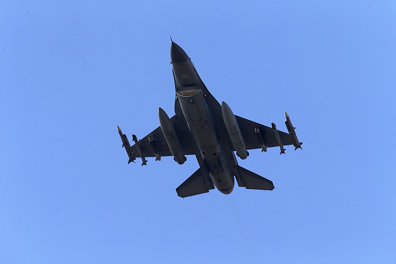 
              FILE -- In this July 29, 2015 file photo, a Turkish Air Force warplane rises in the sky after taking off from Incirlik Air Base, in Adana, southern Turkey. On Tuesday, April 25, 2017, Turkish warplanes carried out airstrikes against suspected Kurdish rebel positions in northern Iraq and in northeastern Syria, the military said, in a bid to prevent militants from smuggling fighters and weapons into Turkey. Although Turkey regularly carries out airstrikes against outlawed Kurdistan Workers' Party, or PKK targets in northern Iraq, this was the first time it has struck the Sinjar region. (AP Photo/Emrah Gurel, File)
            