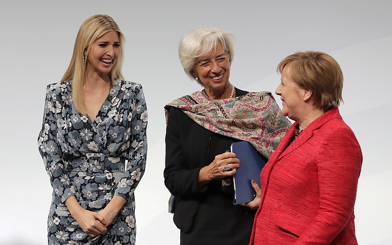 Ivanka Trump, daughter and adviser of U.S. President Donald Trump, International Monetary Fund Managing Director Christine Lagarde and German Chancellor Angela Merkel, from left, chat after a panel at the W20 Summit in Berlin Tuesday, April 25, 2017. The conference aims at building support for investment in women's economic empowerment programs. (AP Photo/Markus Schreiber)