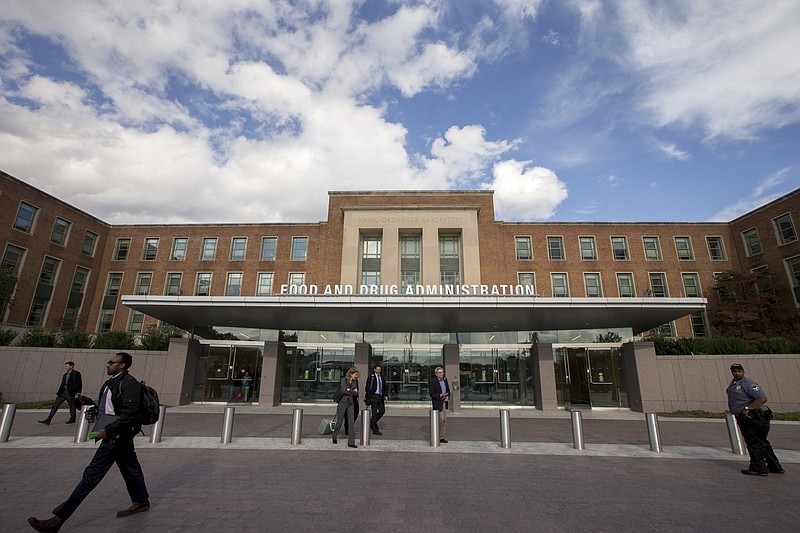 
              FILE - This Wednesday, Oct. 14, 2015, file photo shows the U.S. Food and Drug Administration campus, in Silver Spring, Md. The FDA is  warning consumers to avoid 65 bogus products hawked on the internet with false claims that they can cure, treat or prevent cancer. (AP Photo/Andrew Harnik, File)
            
