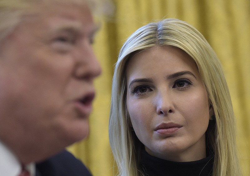 
              Ivanka Trump, listens as her father President Donald Trump, talks via a video conference to astronauts on the International Space Station, Monday, April 24, 2017, from the Oval Office of the White House in Washington. (AP Photo/Susan Walsh)
            