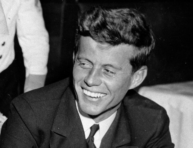 
              FILE - In this Feb. 9, 1944, file photo, U.S. Navy Lt. John F. Kennedy smiles at the Stork Club in New York. A diary written by Kennedy in 1945 during his brief stint as a journalist after World War II is being auctioned on April 26, 2017, by RR Auction in Boston. (AP Photo/File)
            