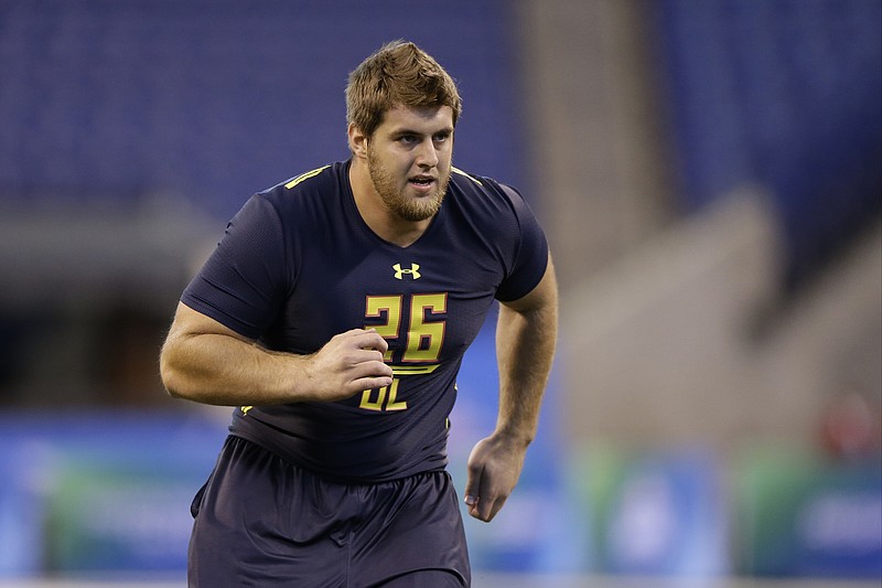 Western Kentucky offensive lineman Forrest Lamp runs a drill at the NFL combine in Indianapolis early last month. The Falcons have their eye on Lamp as a possible first-round draft pick tonight in Philadelphia.