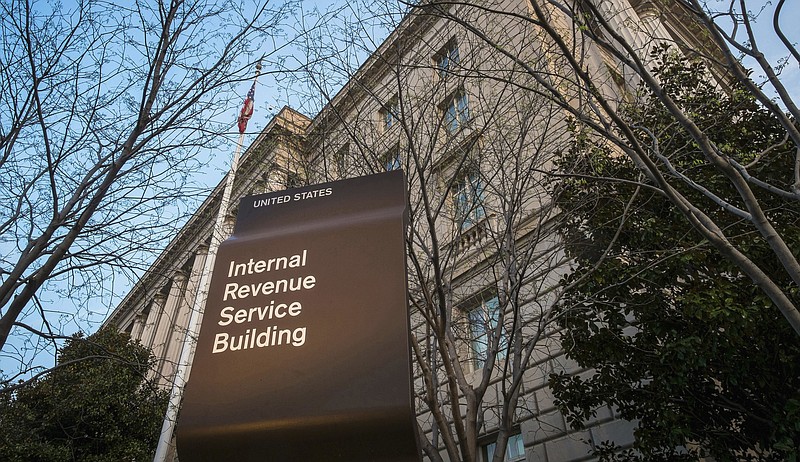 
              FILE - This April 13, 2014, file photo shows the Internal Revenue Service (IRS) headquarters building in Washington. President Donald Trump’s plan to provide massive tax breaks to corporations faces big challenges as Washington struggles with mounting debt and the populist president tries to make good on promises to bring jobs and prosperity to the middle class. (AP Photo/J. David Ake, File)
            