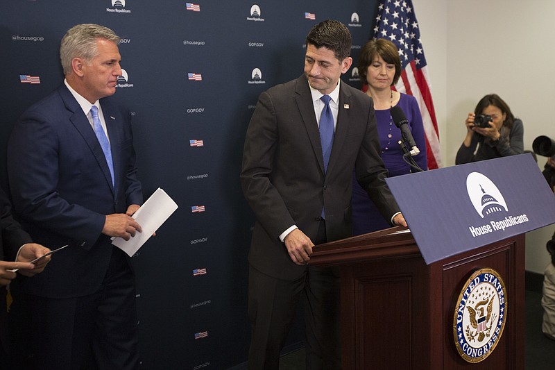 
              House Speaker Paul Ryan of Wis., center, flanked by House Majority Leader Kevin McCarthy of Calif. and Rep. Cathy McMorris Rodgers, R-Wash., leaves the podium during a news conference after a GOP caucus meeting on Capitol Hill in Washington, Wednesday, April 26, 2017. (AP Photo/Evan Vucci)
            