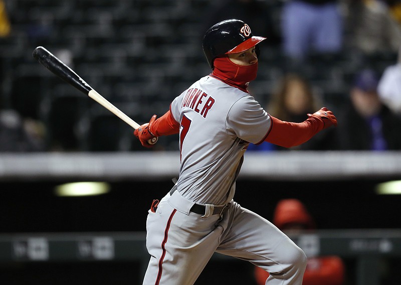 
              Washington Nationals' Trea Turner watches his three-run triple Colorado Rockies relief pitcher Scott Oberg during the seventh inning of a baseball game Tuesday, April 25, 2017, in Denver. Washington won 15-12. (AP Photo/David Zalubowski)
            