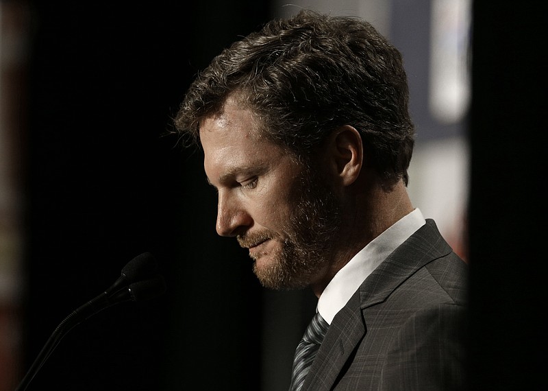 Dale Earnhardt Jr. pauses as he speaks during a news conference at Hendrick Motorsports in Concord, N.C., Tuesday, April 25, 2017. Dale Earnhardt Jr. abruptly announced his retirement at the end of the season Tuesday, April 25, 2017, a decision that will cost NASCAR its most popular driver as the series scrambles to rebuild its fan base. (AP Photo/Chuck Burton)