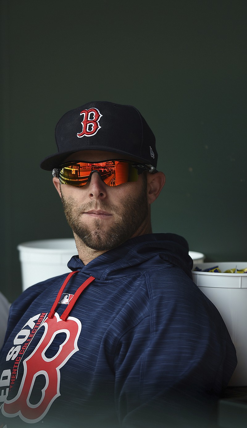 
              Boston Red Sox's Dustin Pedroia watches from the dugout during a baseball game against the Baltimore Orioles, Sunday, April 23, 2017, in Baltimore. (AP Photo/Gail Burton)
            