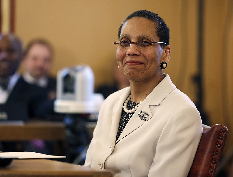 
              FILE - In this April 30, 2013, file photo, Justice Sheila Abdus-Salaam looks on as members of the state Senate Judiciary Committee vote unanimously to advance her nomination to fill a vacancy on the Court of Appeals at the Capitol in Albany, N.Y. Abdus-Salaam's body was found on the shore of the Hudson River, April 12, 2017. She was the first black woman on New York state's highest court. (AP Photo/File, Mike Groll, File)
            