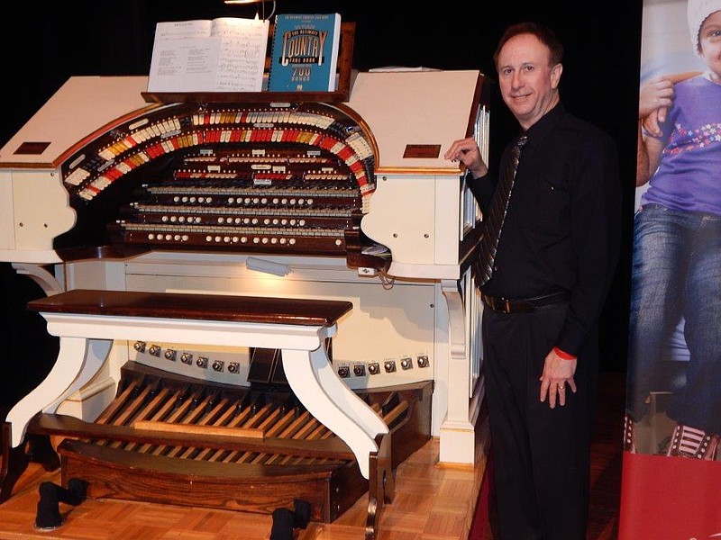 Organist Larry Davis with the "Mighty Wurlitzer"