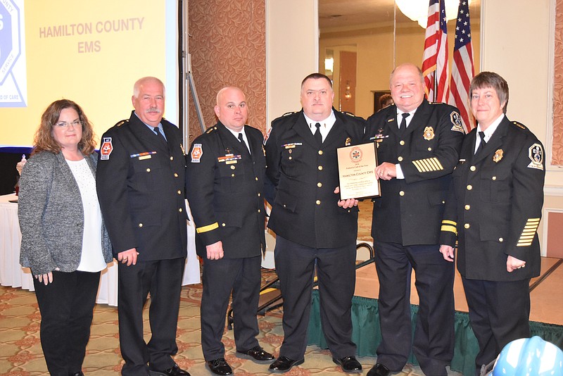 Left to Right: Leslie Phelps Children's Hospital at Erlanger, HCEMS personnel Bob Williams, Lt. Brian Bricker, Lt. David Burdett, Deputy Chief John Combes and Captain Darlene Poole.