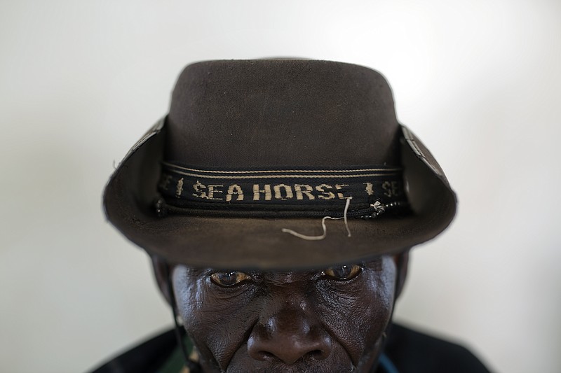 
              In this Monday, April 3, 2017 photo, Alfred Wani , 80, a South Sudanese refugee from Morobo, waits to be checked by doctors after arriving at the Imvepi Camp in Northern Uganda. Wani and 27 relatives crossed into Uganda to escape South Sudan's civil war. The surge of more than half a million South Sudanese refugees into Uganda since July has created Africa's largest refugee crisis. (AP Photo/Jerome Delay)
            