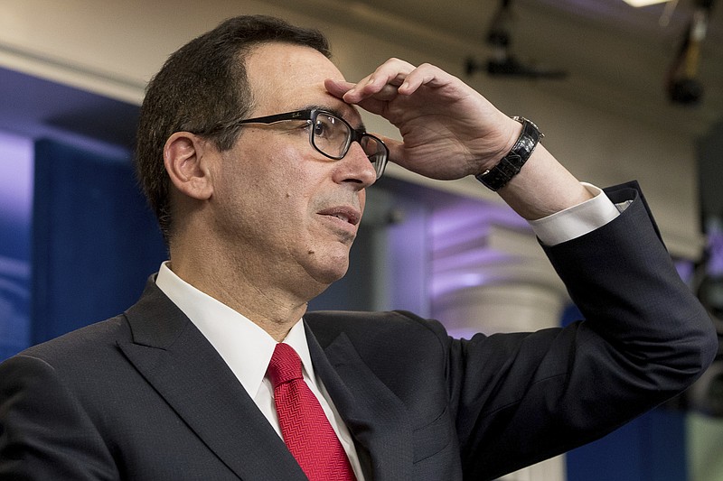 
              Treasury Secretary Steve Mnuchin takes a question in the briefing room of the White House in Washington, Wednesday, April 26, 2017, where he discussed President Donald Trump tax proposals. (AP Photo/Andrew Harnik)
            