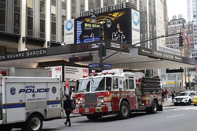 
              FILE - In this Monday, April 3, 2017, file photo, police and fire vehicles respond to news of a train derailment at Penn Station, in New York. Accelerated repair work in the wake of recent breakdowns at New York’s Penn Station will begin in May and cause delays this summer for rail travelers who already have endured major disruptions recently, Amtrak officials said Thursday, April 27, 2017. (AP Photo/Mark Lennihan, File)
            