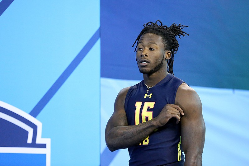 Tennessee running back Alvin Kamara performs in the vertical jump at the 2017 NFL football scouting combine Friday, March 3, 2017, in Indianapolis. (AP Photo/Gregory Payan)