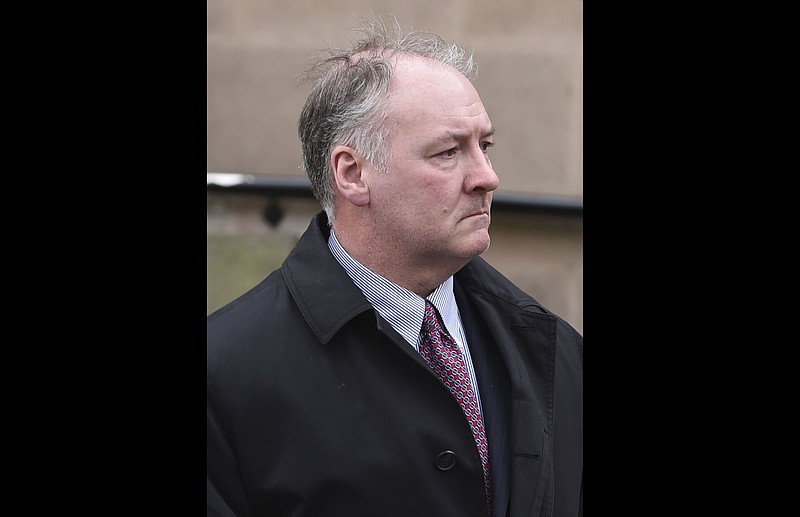 
              FILE - In this Tuesday Feb. 21, 2017 file photo, former breast surgeon Ian Paterson arrives at Nottingham Crown Court in Nottingham, England. A jury in central England has found a prominent breast surgeon guilty of carrying out unnecessary operations. The Nottingham Crown Court jury found Ian Paterson guilty on Friday, April 28 of 17 counts of wounding with intent to cause grievous bodily harm and three counts of unlawful wounding. Prosecutors say the 59-year-old doctor lied to patients or exaggerated their risk of cancer to persuade them to have surgery. (Joe Giddens/PA via AP, file)
            