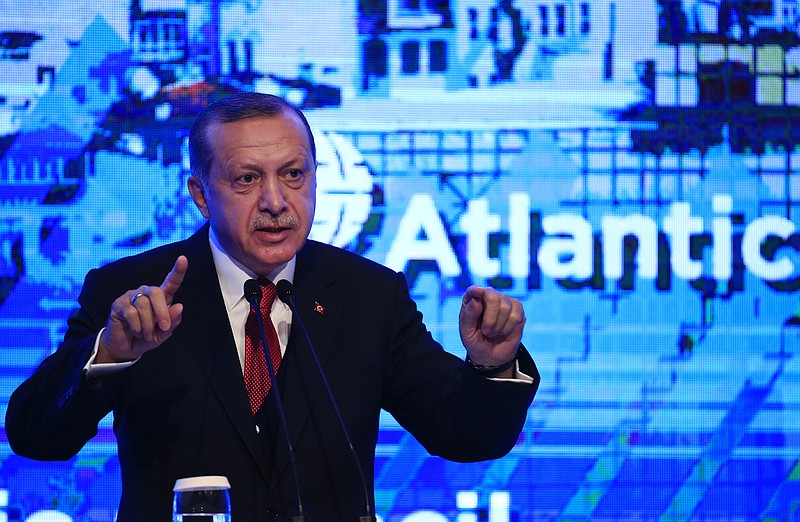 
              Turkey's President Recep Tayyip Erdogan, gestures as he delivers a speech at an Atlantic Council event in Istanbul, Friday, April 28, 2017. (AP Photo/Lefteris Pitarakis)
            