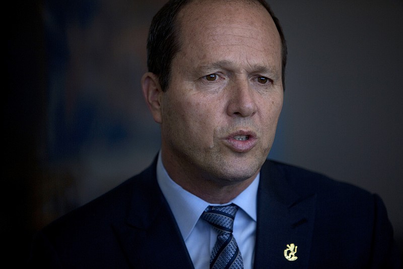 
              In this Tuesday, April 25, 2017 photo, Jerusalem Mayor, Nir Barkat speaks during an interview with the Associated Press at his office in Jerusalem. Fifty years after Israel conquered east Jerusalem, Barkat said that the anniversary is a time to celebrate, despite the deep rifts and occasional bursts of violence that disrupt daily life in the volatile city. But like other prominent politicians of the hard-line Likud party, Barkat said Jerusalem must remain united under Israeli control, rejects Arab claims that they are second-class residents and insists the city's diverse array of residents are 
“all my children." (AP Photo/Sebastian Scheiner)
            